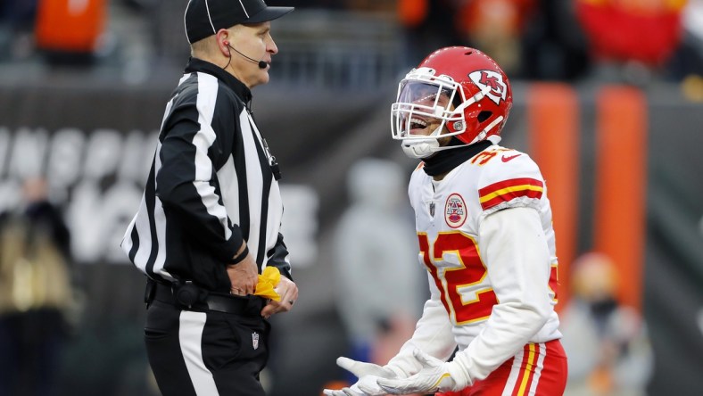 Jan 2, 2022; Cincinnati, Ohio, USA; Kansas City Chiefs free safety Tyrann Mathieu (32) talks to the official after a personal foul call that extended the Bengals drive during the fourth quarter at Paul Brown Stadium. Mandatory Credit: Joseph Maiorana-USA TODAY Sports