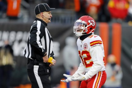Jan 2, 2022; Cincinnati, Ohio, USA; Kansas City Chiefs free safety Tyrann Mathieu (32) talks to the official after a personal foul call that extended the Bengals drive during the fourth quarter at Paul Brown Stadium. Mandatory Credit: Joseph Maiorana-USA TODAY Sports