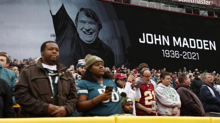 Jan 2, 2022; Landover, Maryland, USA; Fans observe a moment of silence for the late John Madden prior to the game between the Washington Football Team and the Philadelphia Eagles at FedExField. Mandatory Credit: Geoff Burke-USA TODAY Sports