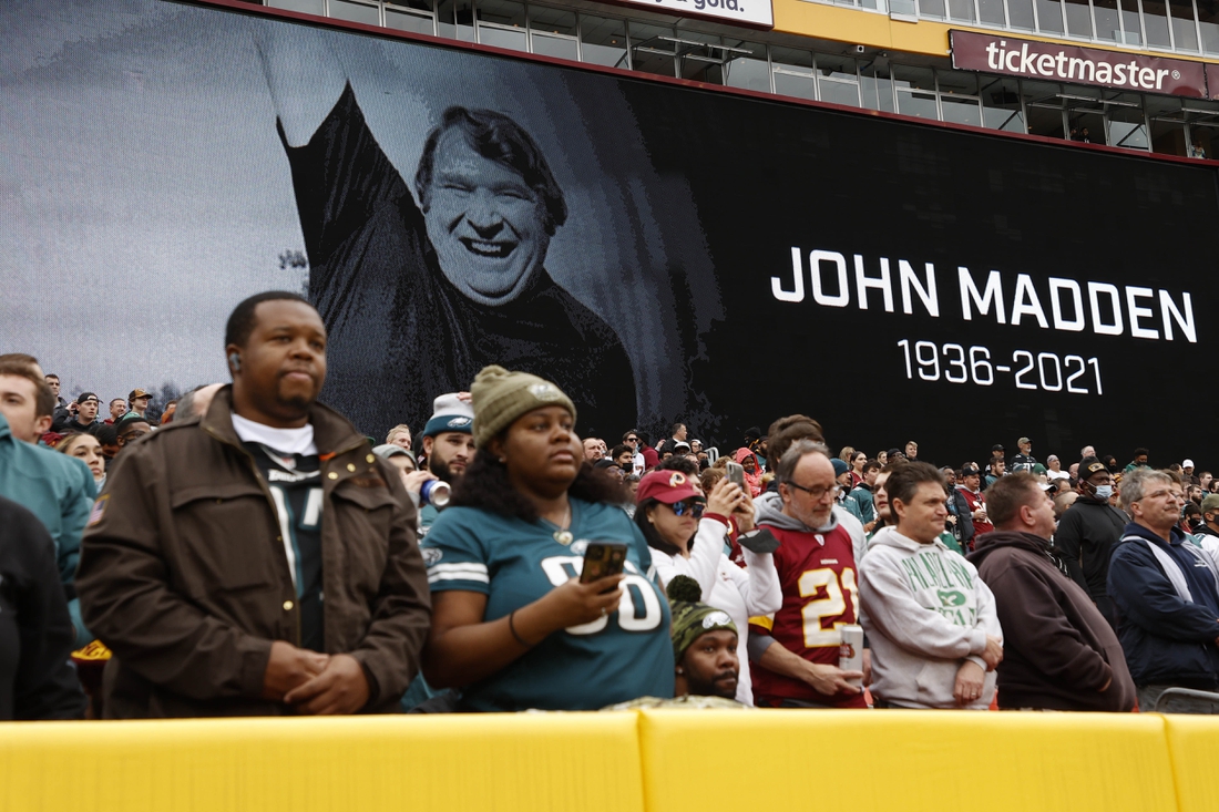 Jan 2, 2022; Landover, Maryland, USA; Fans observe a moment of silence for the late John Madden prior to the game between the Washington Football Team and the Philadelphia Eagles at FedExField. Mandatory Credit: Geoff Burke-USA TODAY Sports