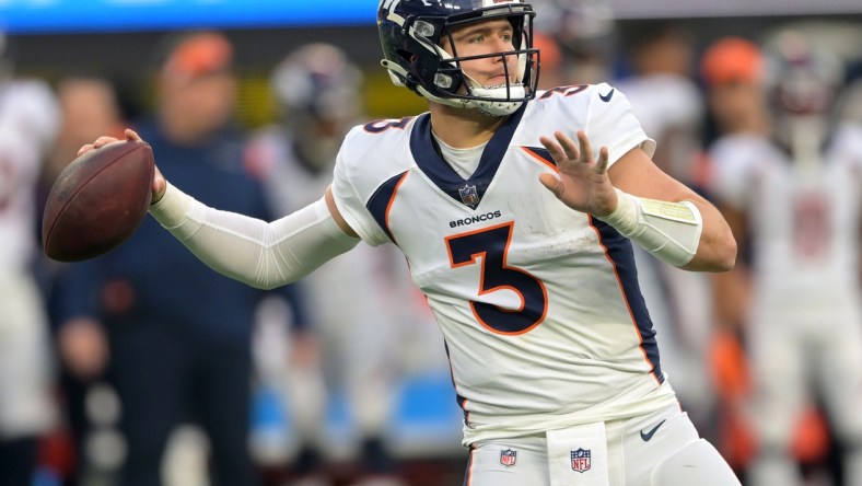 Jan 2, 2022; Inglewood, California, USA; Denver Broncos quarterback Drew Lock (3) sets to pass in the second half the game against the Los Angeles Chargers at SoFi Stadium. Mandatory Credit: Jayne Kamin-Oncea-USA TODAY Sports