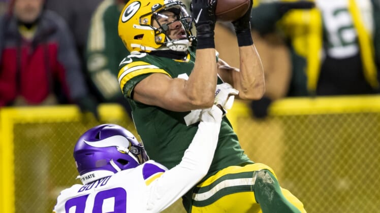 Packers clinch top seed in NFC with rout of Vikings