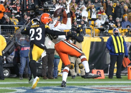 Jan 3, 2022; Pittsburgh, Pennsylvania, USA;  Cleveland Browns tight end David Njoku (85) catches a three yard touchdown pass against Pittsburgh Steelers cornerback Joe Haden (23) during the third quarter at Heinz Field. Mandatory Credit: Charles LeClaire-USA TODAY Sports