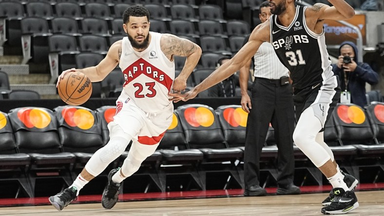 Jan 4, 2022; Toronto, Ontario, CAN; Toronto Raptors guard Fred VanVleet (23) drives to the net against San Antonio Spurs forward Keita Bates-Diop (31) during the second half at Scotiabank Arena. Mandatory Credit: John E. Sokolowski-USA TODAY Sports