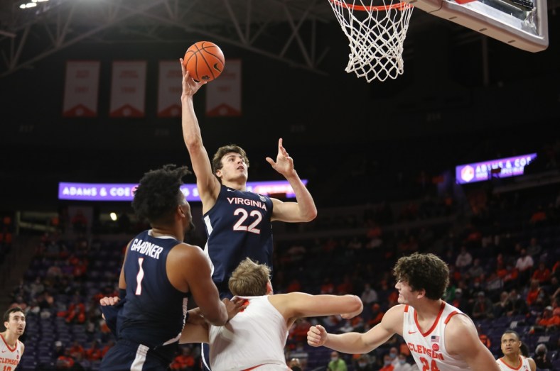 Jan 4, 2022; Clemson, South Carolina, USA; Virginia Cavaliers center Francisco Caffaro (22) shoots the ball against the Clemson Tigers during the first half at Littlejohn Coliseum. Mandatory Credit: Dawson Powers-USA TODAY Sports