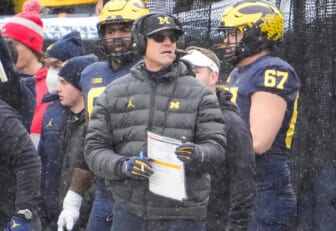 Michigan Wolverines head coach Jim Harbaugh stands on the sideline during the NCAA football game at Michigan Stadium in Ann Arbor on Monday, Nov. 29, 2021.Ohio State Buckeyes At Michigan Wolverines