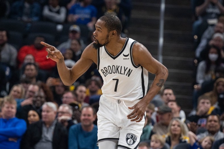 Jan 5, 2022; Indianapolis, Indiana, USA; Brooklyn Nets forward Kevin Durant (7) reacts to a made basket in the first quarter against the Indiana Pacers at Gainbridge Fieldhouse. Mandatory Credit: Trevor Ruszkowski-USA TODAY Sports