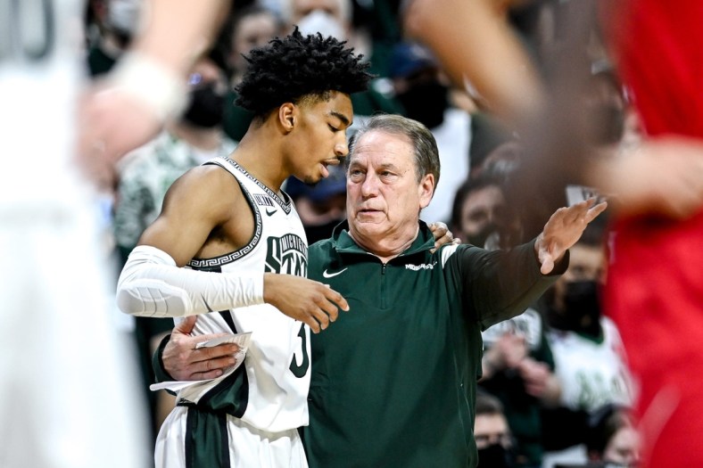 Michigan State's head coach Tom Izzo, right, takes with Jaden Akins during the second half in the game against Nebraska on Wednesday, Jan. 5, 2022, at the Breslin Center in East Lansing.

220105 Msu Neb 159a