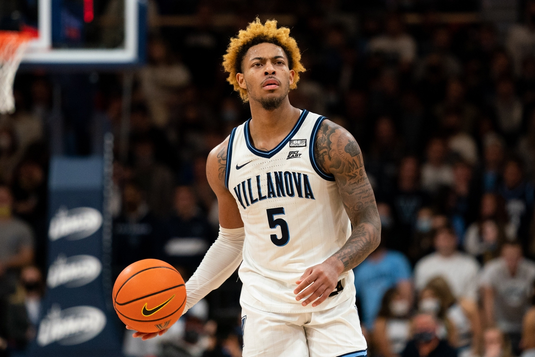 Jan 5, 2022; Villanova, Pennsylvania, USA; Villanova Wildcats guard Justin Moore (5) dribbles the ball against the Creighton Bluejays during the second half at William B. Finneran Pavilion. Mandatory Credit: Bill Streicher-USA TODAY Sports