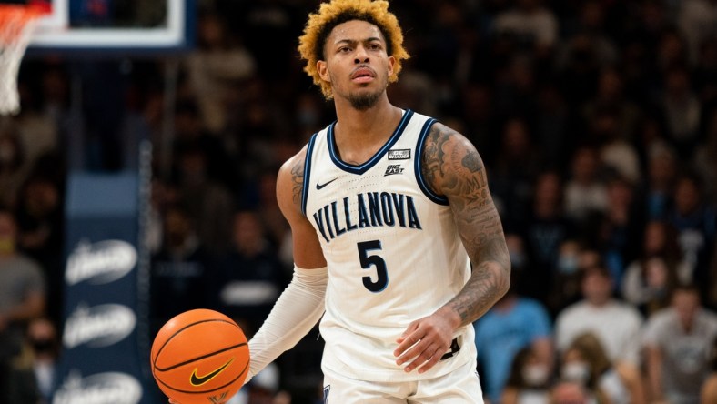 Jan 5, 2022; Villanova, Pennsylvania, USA; Villanova Wildcats guard Justin Moore (5) dribbles the ball against the Creighton Bluejays during the second half at William B. Finneran Pavilion. Mandatory Credit: Bill Streicher-USA TODAY Sports