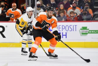 Jan 6, 2022; Philadelphia, Pennsylvania, USA; Philadelphia Flyers center Kevin Hayes (13) looks to pass against Pittsburgh Penguins center Evan Rodrigues (9) during the second period at Wells Fargo Center. Mandatory Credit: Eric Hartline-USA TODAY Sports