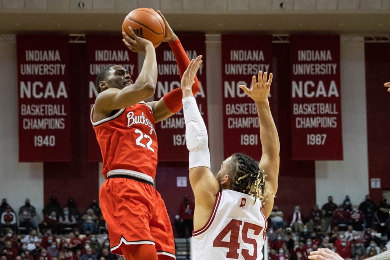 Jan 6, 2022; Bloomington, Indiana, USA; Ohio State Buckeyes guard Malaki Branham (22) shoots the ball while Indiana Hoosiers guard Parker Stewart (45) defends in the second half at Simon Skjodt Assembly Hall. Mandatory Credit: Trevor Ruszkowski-USA TODAY Sports