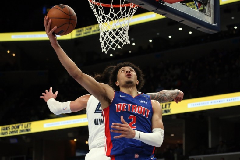 Jan 6, 2022; Memphis, Tennessee, USA; Detroit Pistons guard Cade Cunningham (2) drives to the basket during the first half against the Memphis Grizzles at FedExForum. Mandatory Credit: Petre Thomas-USA TODAY Sports