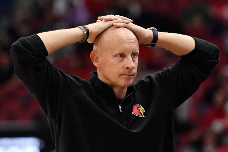 Dec 29, 2021; Louisville, Kentucky, USA;  Louisville Cardinals head coach Chris Mack reacts during the second half against the Wake Forest Demon Deacons at KFC Yum! Center. Louisville defeated Wake Forest 73-69. Mandatory Credit: Jamie Rhodes-USA TODAY Sports
