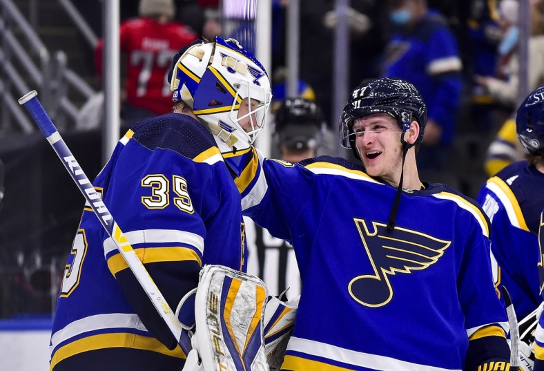 Jan 7, 2022; St. Louis, Missouri, USA;  St. Louis Blues defenseman Torey Krug (47) and goaltender Ville Husso (35) celebrate after the Blues defeated the Washington Capitals at Enterprise Center. Mandatory Credit: Jeff Curry-USA TODAY Sports