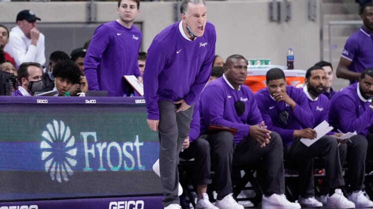 Jan 8, 2022; Fort Worth, Texas, USA;  TCU Horned Frogs head coach Jamie Dixon calls a play against the Baylor Bears during the first half at Ed and Rae Schollmaier Arena. Mandatory Credit: Chris Jones-USA TODAY Sports