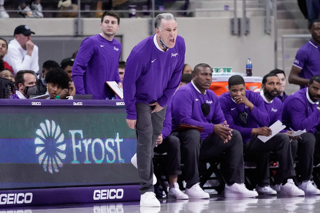 Jan 8, 2022; Fort Worth, Texas, USA;  TCU Horned Frogs head coach Jamie Dixon calls a play against the Baylor Bears during the first half at Ed and Rae Schollmaier Arena. Mandatory Credit: Chris Jones-USA TODAY Sports