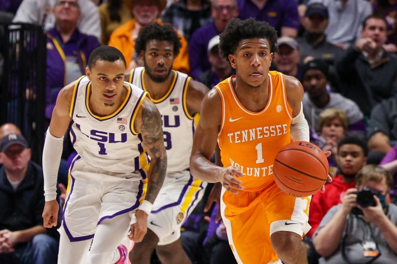 Jan 8, 2022; Baton Rouge, Louisiana, USA;  Tennessee Volunteers guard Kennedy Chandler (1) controls the ball against LSU Tigers guard Xavier Pinson (1) during the second half at Pete Maravich Assembly Center. Mandatory Credit: Stephen Lew-USA TODAY Sports