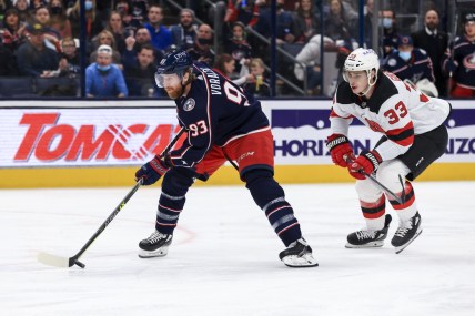 Jan 8, 2022; Columbus, Ohio, USA;  Columbus Blue Jackets right wing Jakub Voracek (93) skates against New Jersey Devils defenseman Ryan Graves (33) in the second period at Nationwide Arena. Mandatory Credit: Aaron Doster-USA TODAY Sports