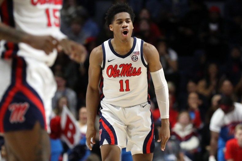 Jan 8, 2022; Oxford, Mississippi, USA; Mississippi Rebels guard Matthew Murrell (11) reacts after a three point basket during the first half again the Mississippi State Bulldogs at The Sandy and John Black Pavilion at Ole Miss. Mandatory Credit: Petre Thomas-USA TODAY Sports