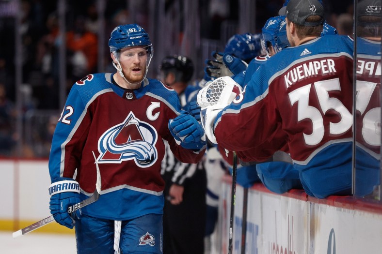 Jan 8, 2022; Denver, Colorado, USA; Colorado Avalanche left wing Gabriel Landeskog (92) celebrates with the bench after his goal in the third period against the Toronto Maple Leafs at Ball Arena. Mandatory Credit: Isaiah J. Downing-USA TODAY Sports