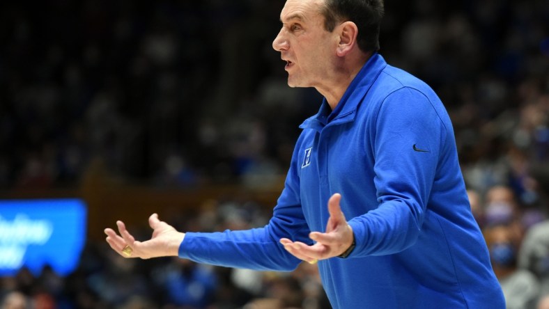 Jan 8, 2022; Durham, North Carolina, USA; Duke Blue Devils head coach Mike Krzyzewski reacts during the second half against the Miami Hurricanes at Cameron Indoor Stadium. Mandatory Credit: Rob Kinnan-USA TODAY Sports