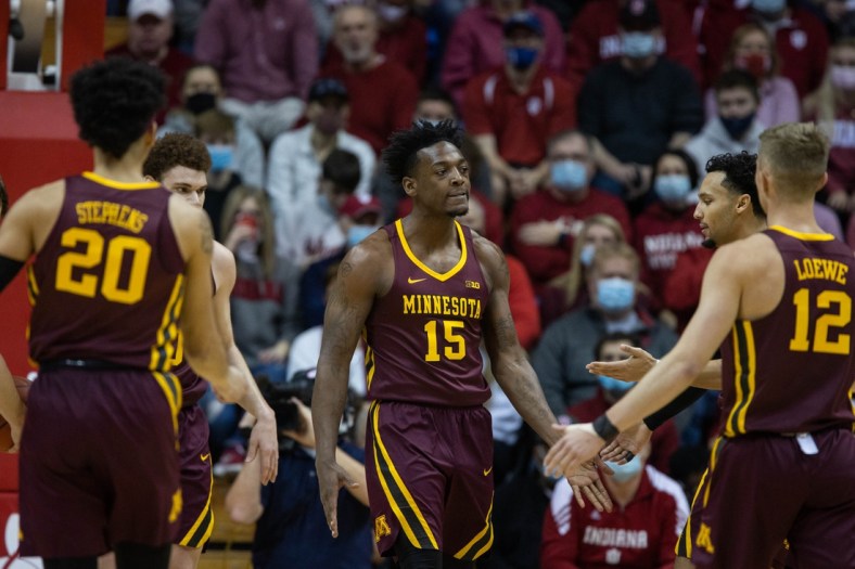 Jan 9, 2022; Bloomington, Indiana, USA; Minnesota Golden Gophers forward Eric Curry (1) reacts to a basket in the first half against the Indiana Hoosiers at Simon Skjodt Assembly Hall. Mandatory Credit: Trevor Ruszkowski-USA TODAY Sports