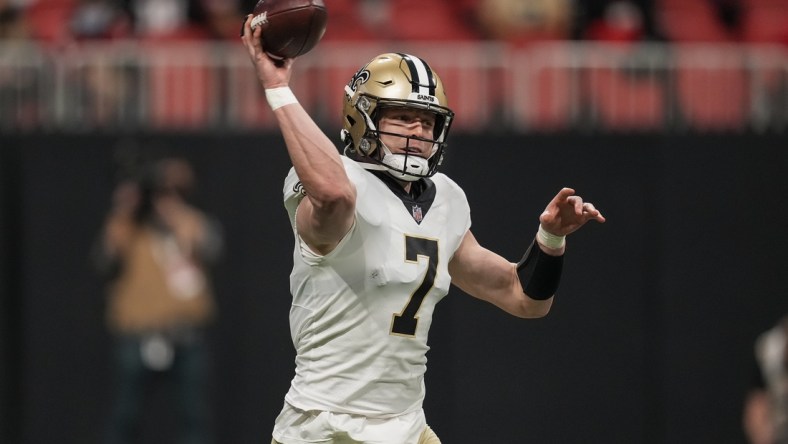 Jan 9, 2022; Atlanta, Georgia, USA; New Orleans Saints quarterback Taysom Hill (7) passes against the Atlanta Falcons during the first quarter at Mercedes-Benz Stadium. Mandatory Credit: Dale Zanine-USA TODAY Sports