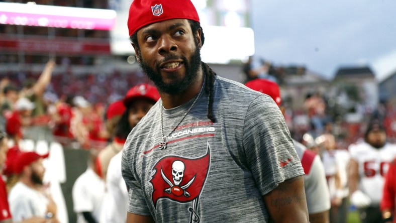 Jan 9, 2022; Tampa, Florida, USA;Tampa Bay Buccaneers cornerback Richard Sherman (5) looks on against the Carolina Panthers during the first half at Raymond James Stadium. Mandatory Credit: Kim Klement-USA TODAY Sports