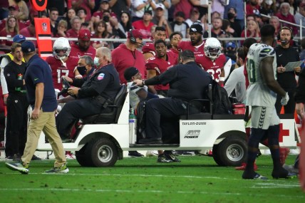 Jan 9, 2022; Glendale, Arizona, USA; Seattle Seahawks free safety Quandre Diggs (6) is carted off the field against the Arizona Cardinals during the second half at State Farm Stadium. Mandatory Credit: Joe Camporeale-USA TODAY Sports