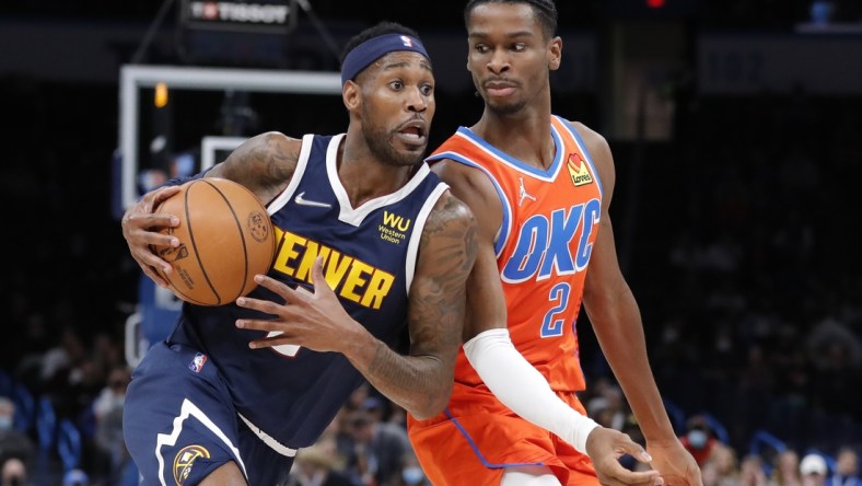 Jan 9, 2022; Oklahoma City, Oklahoma, USA; Denver Nuggets forward Will Barton (5) drives to the basket against Oklahoma City Thunder guard Shai Gilgeous-Alexander (2) during the second quarter at Paycom Center. Mandatory Credit: Alonzo Adams-USA TODAY Sports