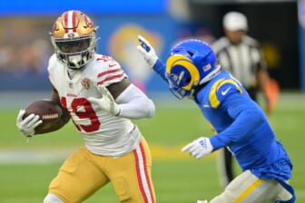 Jan 9, 2022; Inglewood, California, USA;  San Francisco 49ers wide receiver Deebo Samuel (19) runs for a first down to the 10-yard line in the second half of the game against the Los Angeles Rams at SoFi Stadium. Mandatory Credit: Jayne Kamin-Oncea-USA TODAY Sports