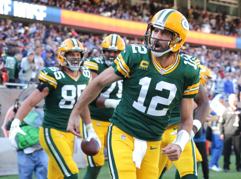 Green Bay Packers quarterback Aaron Rodgers (12) celebrates his rushing touchdown during the fourth quarter of the Green Bay Packers 24-14 win at Soldier Field in Chicago on Sunday, Oct. 17, 2021.

Mjs Packers Bears Packers18 02416