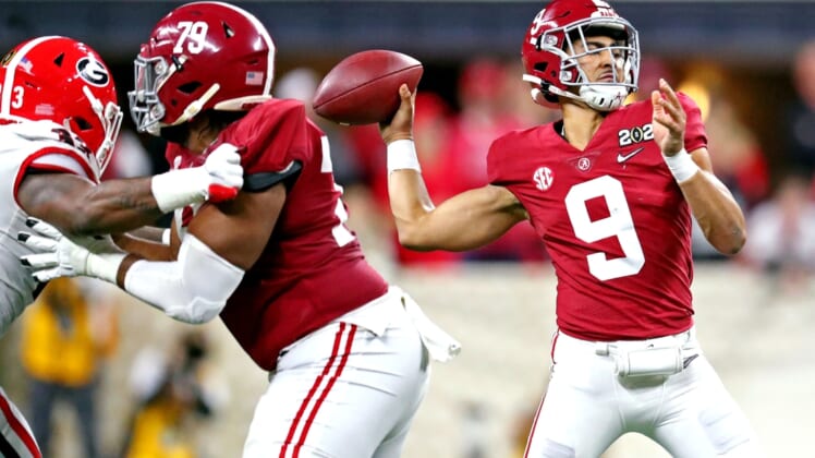 Jan 10, 2022; Indianapolis, IN, USA; Alabama Crimson Tide quarterback Bryce Young (9) throws a pass during the fourth quarter after the game in the 2022 CFP college football national championship game at Lucas Oil Stadium. Mandatory Credit: Mark J. Rebilas-USA TODAY Sports