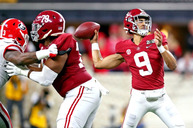 Jan 10, 2022; Indianapolis, IN, USA; Alabama Crimson Tide quarterback Bryce Young (9) throws a pass during the fourth quarter after the game in the 2022 CFP college football national championship game at Lucas Oil Stadium. Mandatory Credit: Mark J. Rebilas-USA TODAY Sports