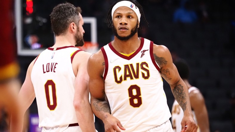 Jan 10, 2022; Sacramento, California, USA; Cleveland Cavaliers forward Lamar Stevens (8) celebrates with forward Kevin Love (0) after a play against the Sacramento Kings during the third quarter at Golden 1 Center. Mandatory Credit: Kelley L Cox-USA TODAY Sports