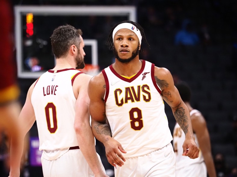 Jan 10, 2022; Sacramento, California, USA; Cleveland Cavaliers forward Lamar Stevens (8) celebrates with forward Kevin Love (0) after a play against the Sacramento Kings during the third quarter at Golden 1 Center. Mandatory Credit: Kelley L Cox-USA TODAY Sports