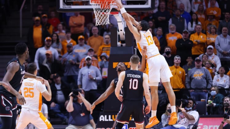 Jan 11, 2022; Knoxville, Tennessee, USA; Tennessee Volunteers forward Olivier Nkamhoua (13) goes to the basket against the South Carolina Gamecocks during the first half at Thompson-Boling Arena. Mandatory Credit: Randy Sartin-USA TODAY Sports