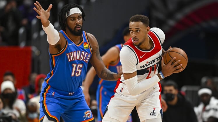Jan 11, 2022; Washington, District of Columbia, USA; Washington Wizards center Daniel Gafford (21) looks to pass as Oklahoma City Thunder center Derrick Favors (15) defends during the first half  at Capital One Arena. Mandatory Credit: Tommy Gilligan-USA TODAY Sports