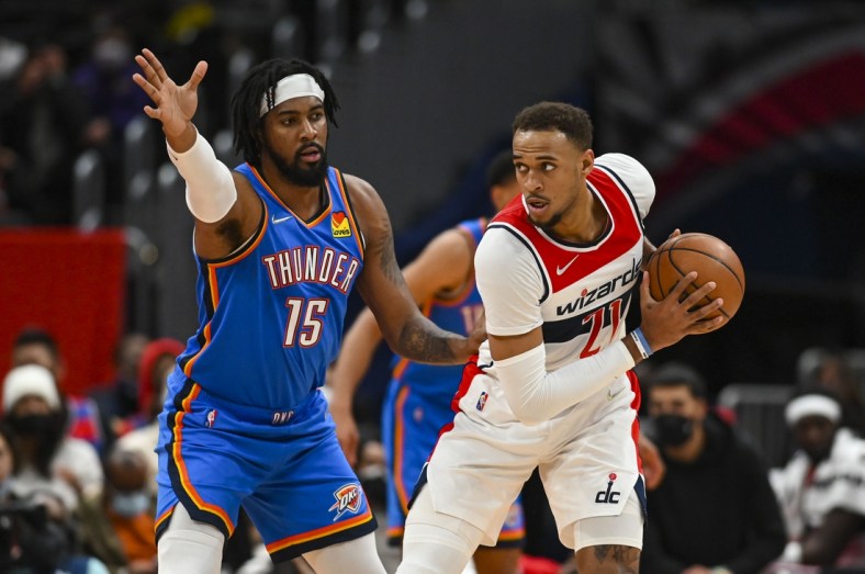 Jan 11, 2022; Washington, District of Columbia, USA; Washington Wizards center Daniel Gafford (21) looks to pass as Oklahoma City Thunder center Derrick Favors (15) defends during the first half  at Capital One Arena. Mandatory Credit: Tommy Gilligan-USA TODAY Sports