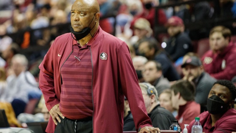 Florida State Seminoles head coach Leonard Hamilton watches as his player shoots a free throw. The Florida State Seminoles defeated the Miami Hurricanes 65-64 Tuesday, Jan. 11, 2022.

Fsu V Miami 723