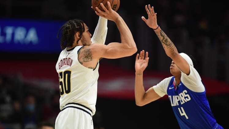Jan 11, 2022; Los Angeles, California, USA; Denver Nuggets forward Aaron Gordon (50) shoots against Los Angeles Clippers guard Brandon Boston Jr. (4) during the first half at Crypto.com Arena. Mandatory Credit: Gary A. Vasquez-USA TODAY Sports
