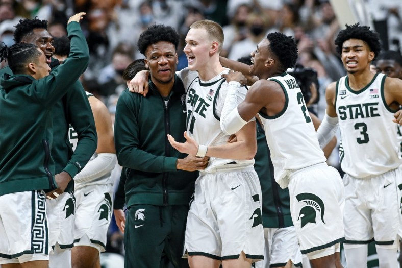 Michigan State's Joey Hauser, center, celebrates after his game winning shot against Minnesota on Wednesday, Jan. 12, 2022, at the Breslin Center in East Lansing.

220112 Msu Minn 243a