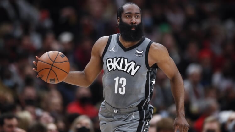 Jan 12, 2022; Chicago, Illinois, USA; Brooklyn Nets guard James Harden (13) dribbles the ball up court against the Chicago Bulls during the second half at United Center. Mandatory Credit: Kamil Krzaczynski-USA TODAY Sports