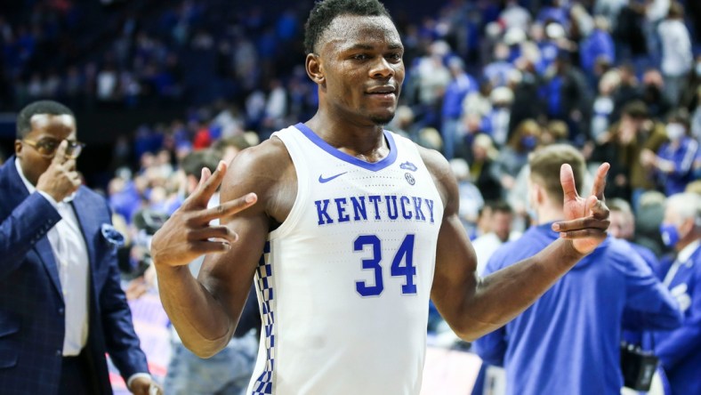 Kentucky's Oscar Tshiebwe walks off the court after the Wildcats defeated Georgia 92-77 Saturday night. The junior forward had his 12th double-double in 15 games with 29 points and 17 rebounds. January 8, 2022.

Kentucky Vs Georgia Jan 8 2022