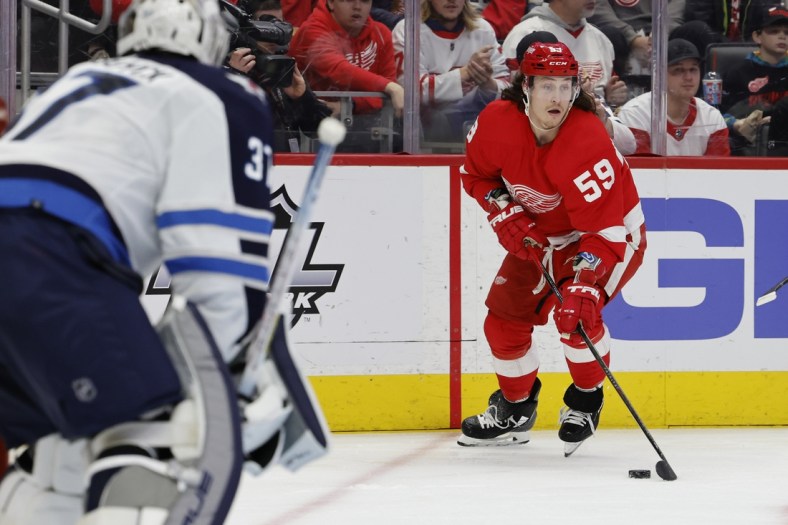 Jan 13, 2022; Detroit, Michigan, USA;  Detroit Red Wings left wing Tyler Bertuzzi (59) skates with the puck in the second period against the Winnipeg Jets at Little Caesars Arena. Mandatory Credit: Rick Osentoski-USA TODAY Sports