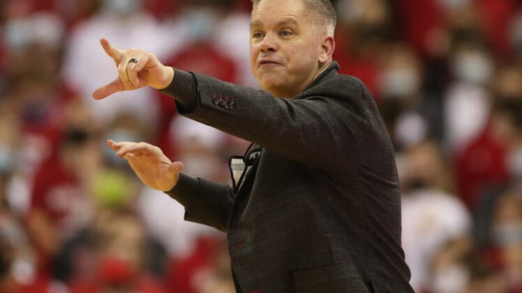 Jan 13, 2022; Madison, Wisconsin, USA; Ohio State Buckeyes head coach Chris Holtmann directs his team during the game with the Wisconsin Badgers at the Kohl Center. Mandatory Credit: Mary Langenfeld-USA TODAY Sports