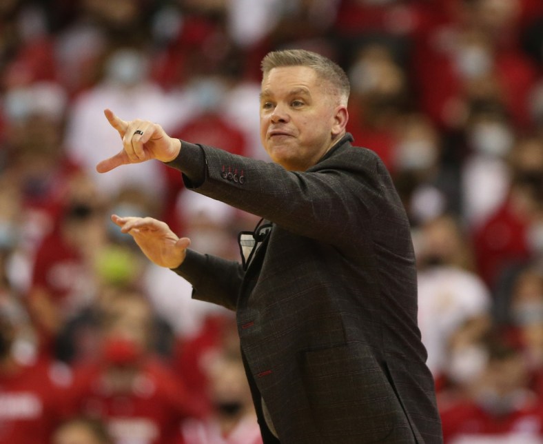 Jan 13, 2022; Madison, Wisconsin, USA; Ohio State Buckeyes head coach Chris Holtmann directs his team during the game with the Wisconsin Badgers at the Kohl Center. Mandatory Credit: Mary Langenfeld-USA TODAY Sports