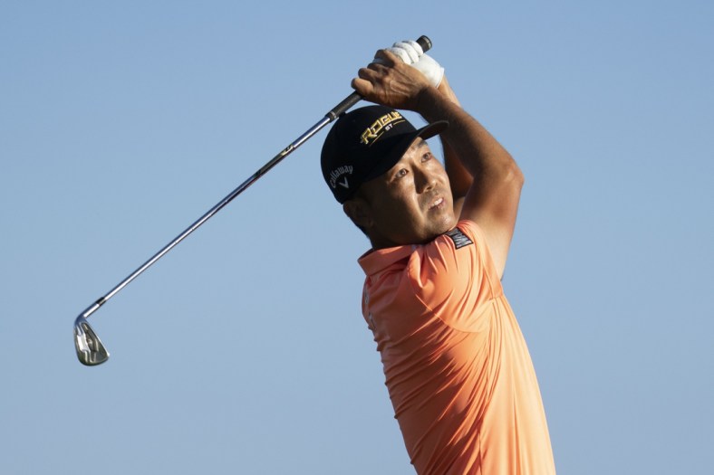 January 13, 2022; Honolulu, Hawaii, USA; Kevin Na hits his tee shot on the 17th hole during the first round of the Sony Open in Hawaii golf tournament at Waialae Country Club. Mandatory Credit: Kyle Terada-USA TODAY Sports