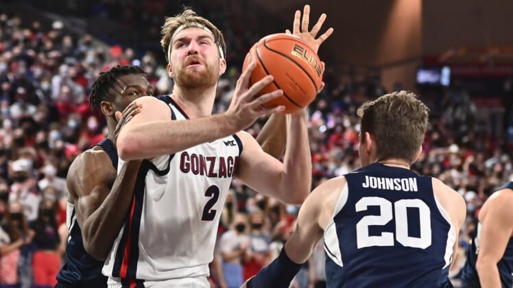Jan 13, 2022; Spokane, Washington, USA; Gonzaga Bulldogs forward Drew Timme (2) shoots the ball against Brigham Young Cougars guard Spencer Johnson (20) in the first half at McCarthey Athletic Center. Mandatory Credit: James Snook-USA TODAY Sports